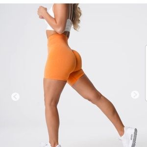 Orange NVGTN Pro Shorts